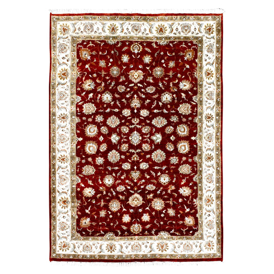 Full view of Indian Ziegler wool and silk rug with deep red floral field and broad ivory border, 300 x 198 cm