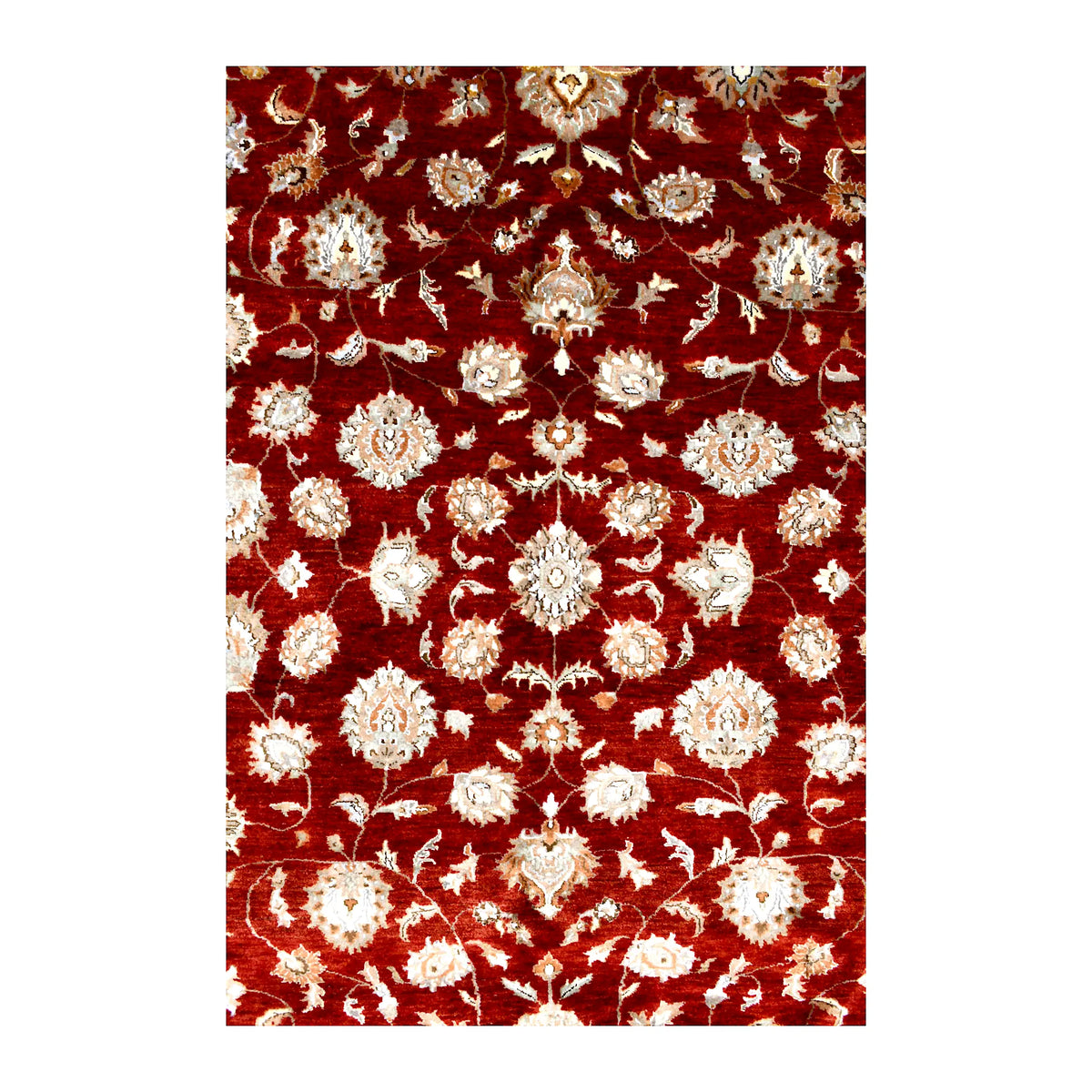 Field detail of Indian Ziegler rug showing repeating pale rosettes and curling vines against deep red