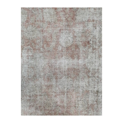 Close-up of ivory blush cotton rug faded abstract surface pattern