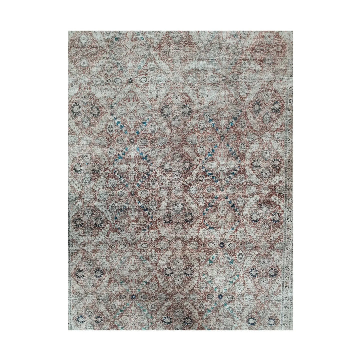 Close-up of ivory blush teal cotton rug floral ornamental pattern detail