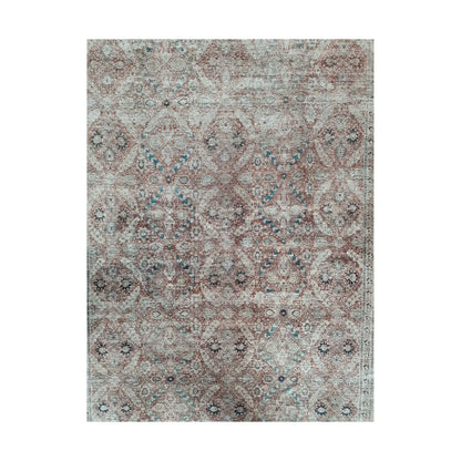 Close-up of ivory blush teal cotton rug floral ornamental pattern detail