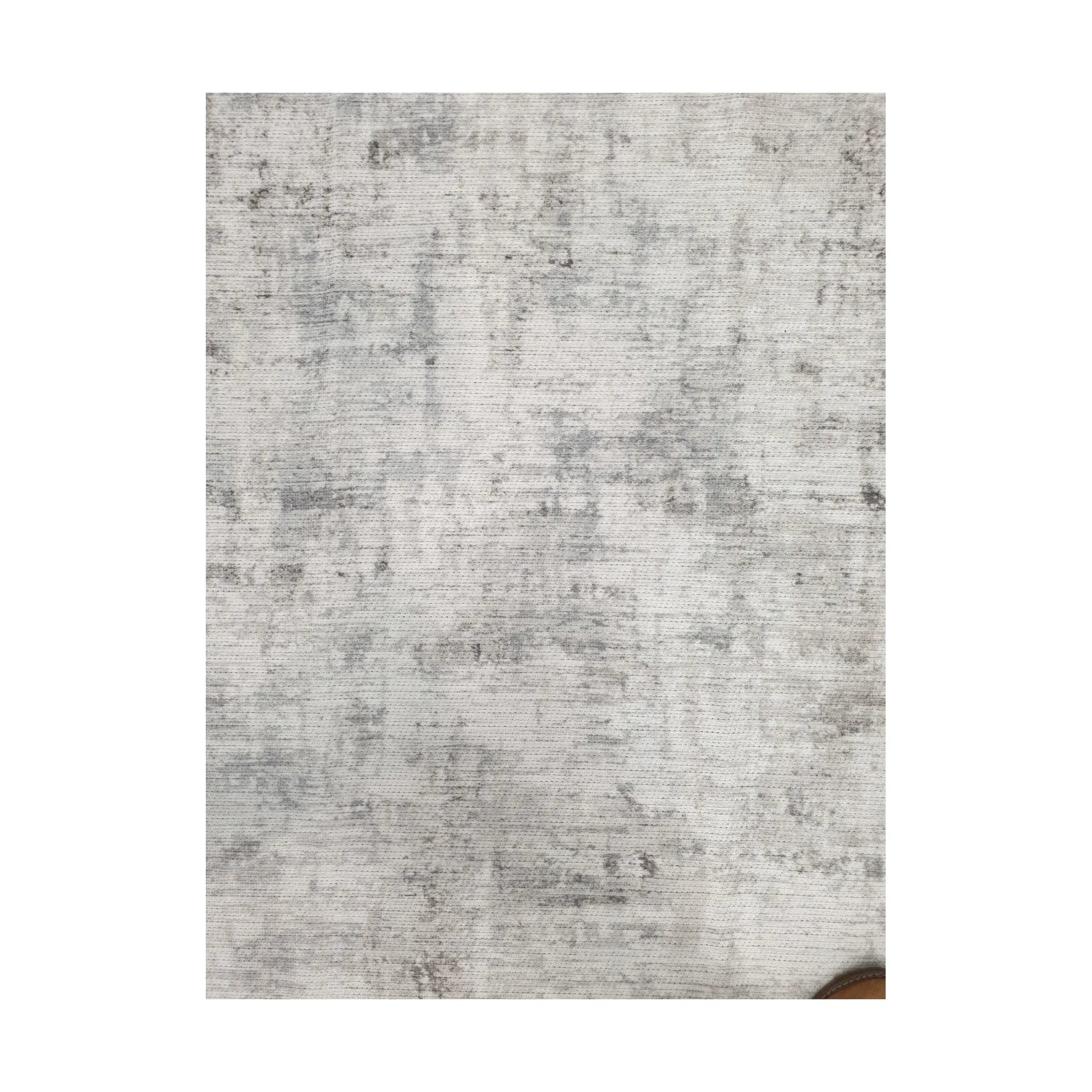Close-up of ivory grey cotton rug abstract textured surface pattern