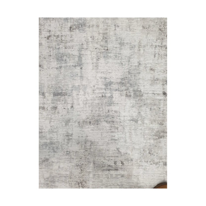 Close-up of ivory grey cotton rug abstract textured surface pattern