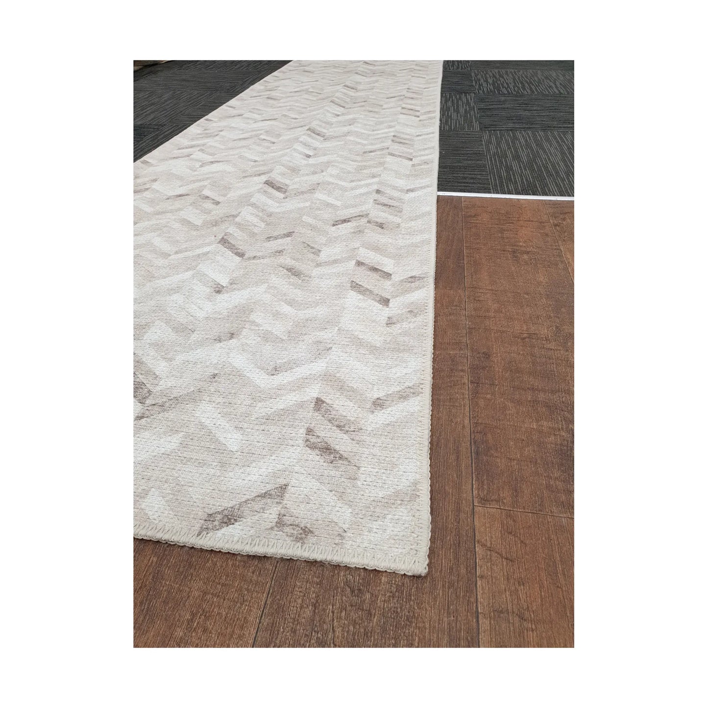 Close-up of ivory grey herringbone cotton runner rug corner and edge detail