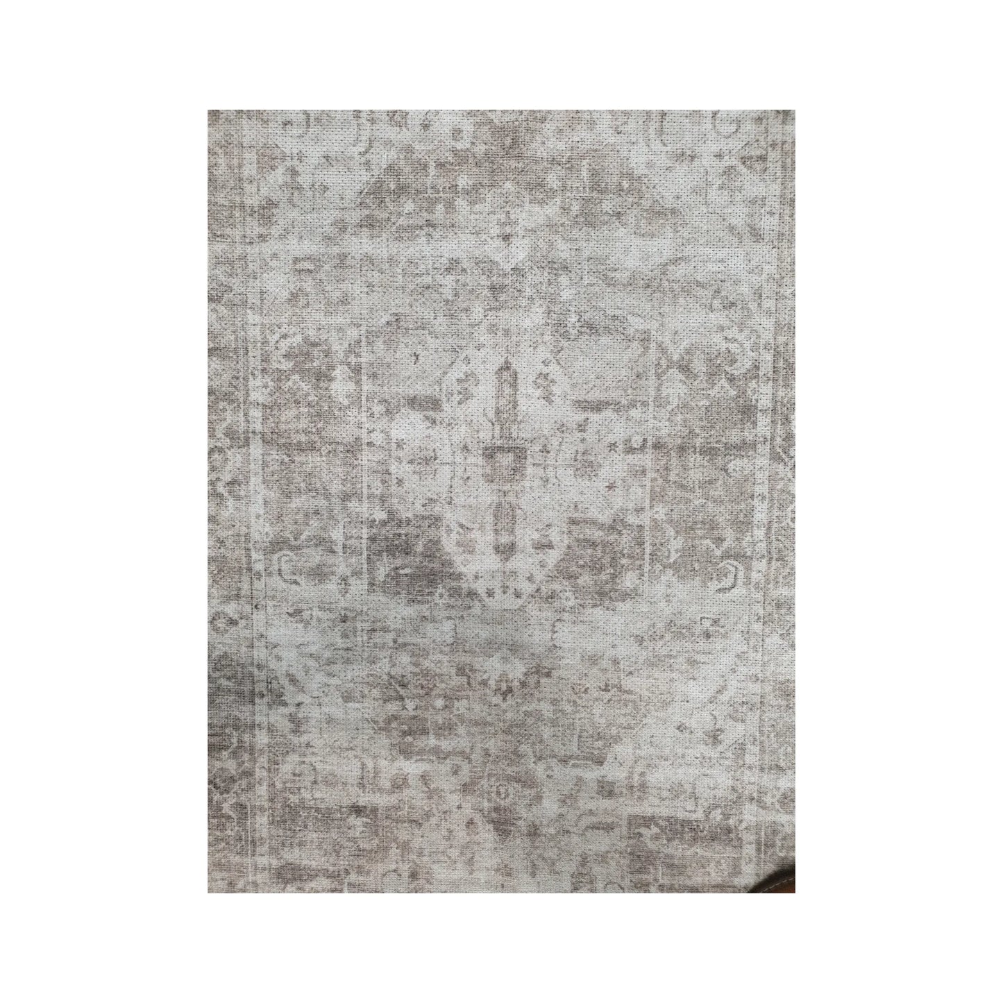 Close-up of ivory grey cotton runner rug faded surface pattern and central detail