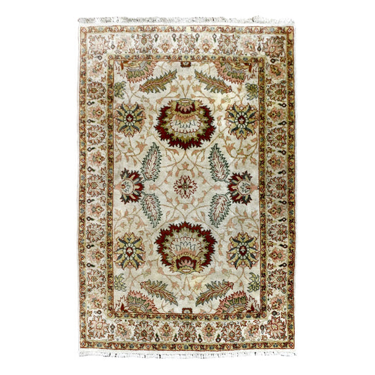Full view of ivory and rust Ziegler hand-knotted wool rug with an all-over floral-palmette design, 178 x 130 cm