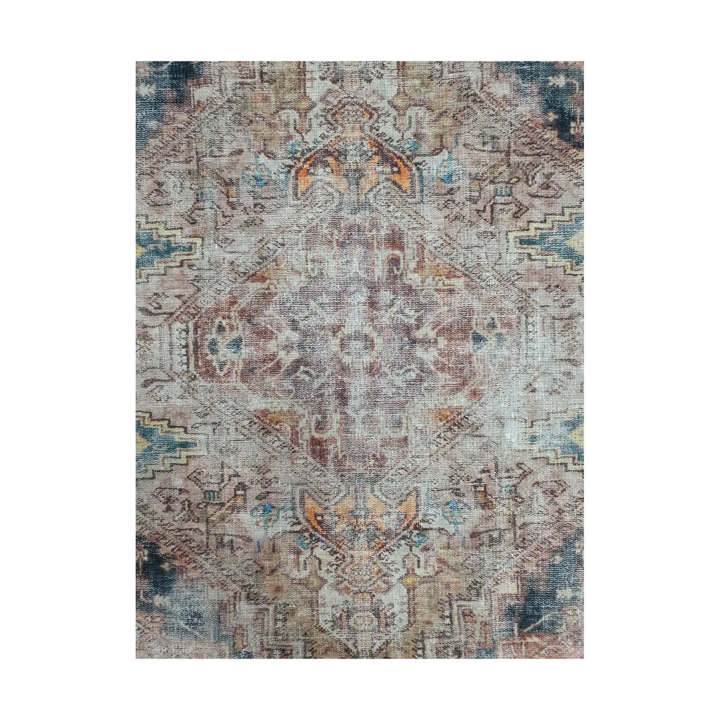 Close-up of ivory teal rust cotton rug central medallion and vintage-style pattern