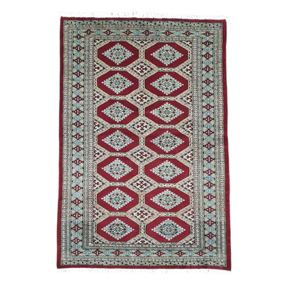 Full view of Jaldar hand-knotted wool rug with deep red octagonal panels, angular guls and layered borders, 191 x 122 cm