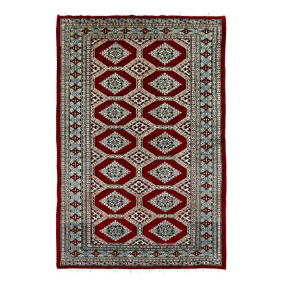 Full view of Jaldar hand-knotted wool rug with deep red octagonal panels, repeating angular guls and geometric borders, 191 x 122 cm