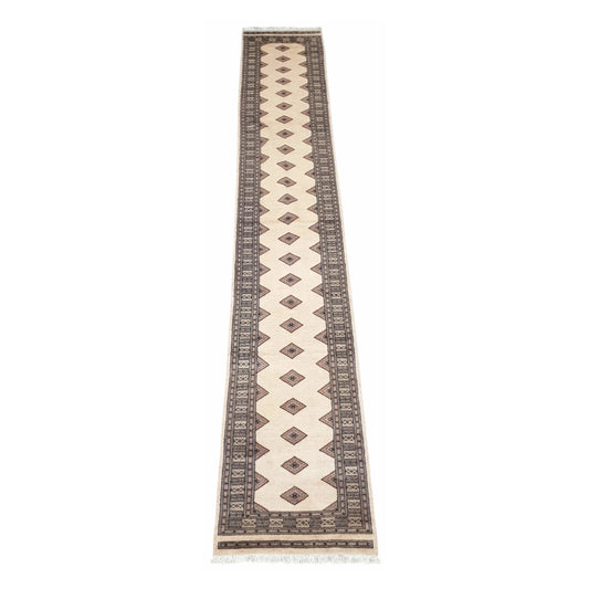 Full view of Jaldar Silk Touch hand-knotted wool runner rug with beige field and black border, 438 x 74 cm