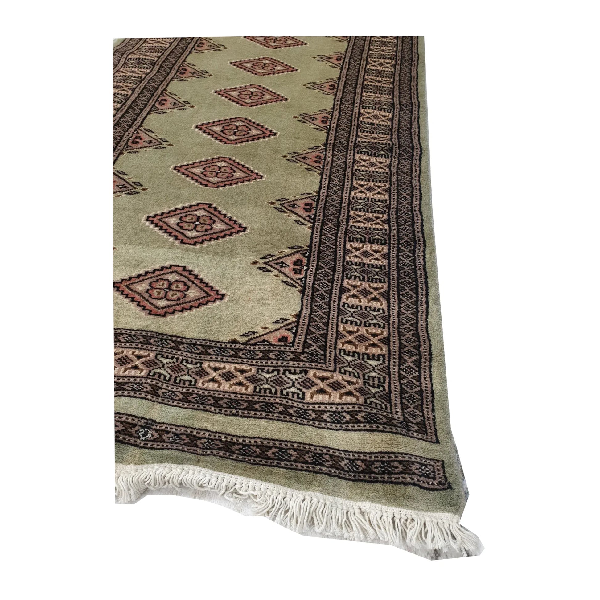 Border and fringe detail of Jaldar Silk Touch hand-knotted wool runner rug showing cream, burgundy and dark brown pattern