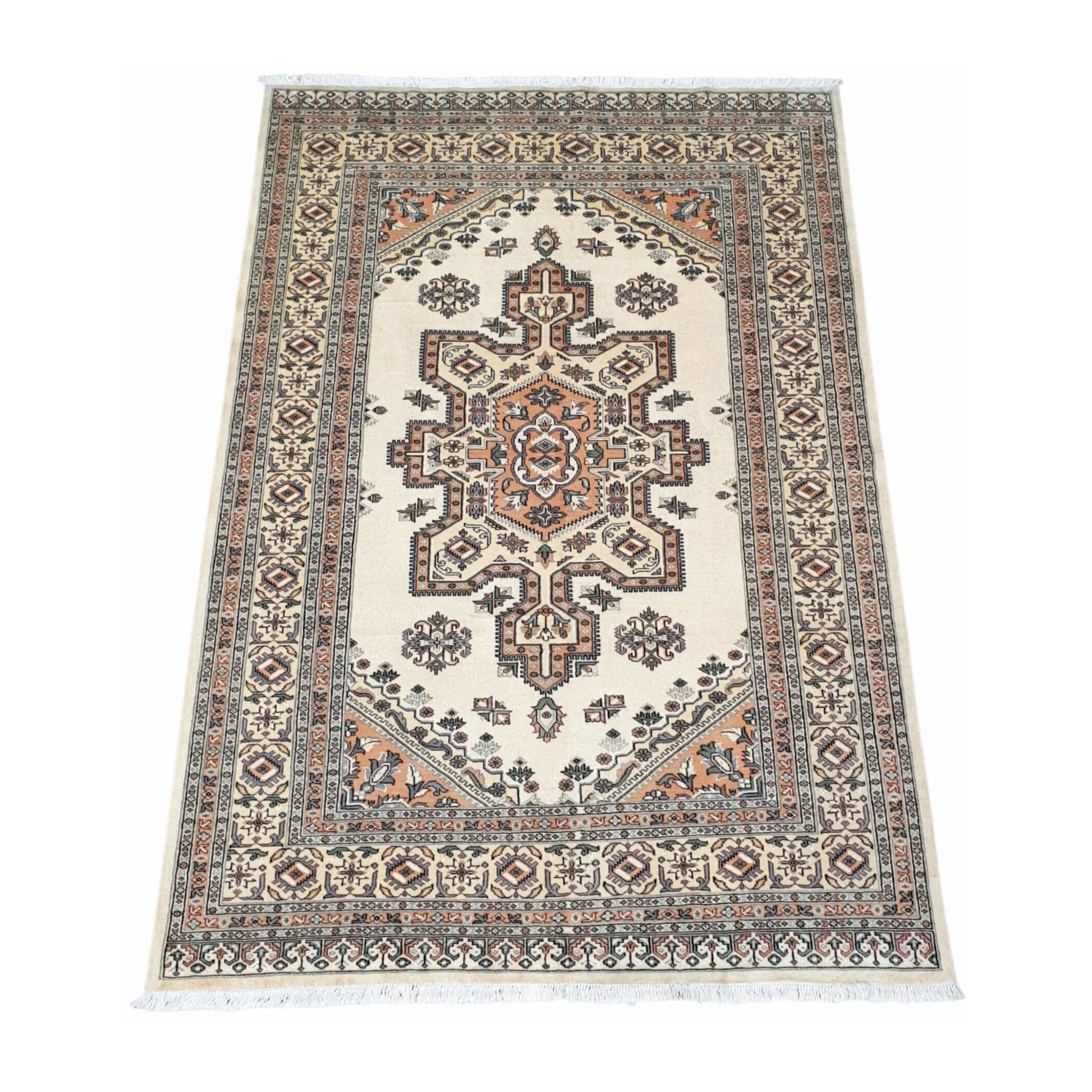 Angled full view of Jaldar wool rug showing the beige field, central geometric medallion and patterned border