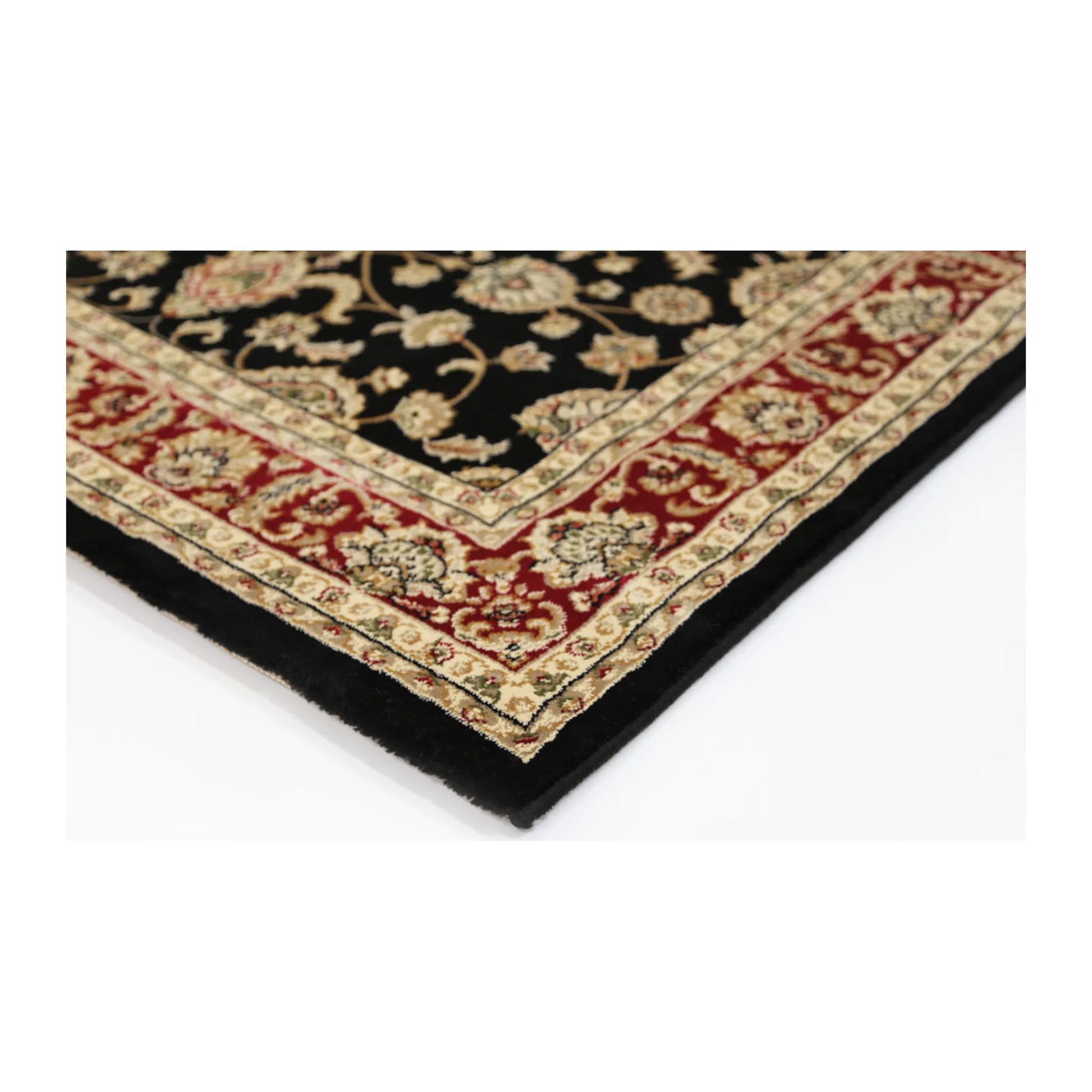Corner detail of Julian 90500 Black Red traditional rug showing bound edge, red border and black patterned field