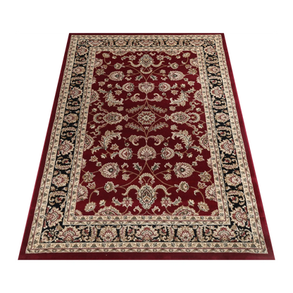 Angled view of Julian 90500 Red Black traditional rug showing red centre field, black border and detailed pattern, 230 x 160 cm