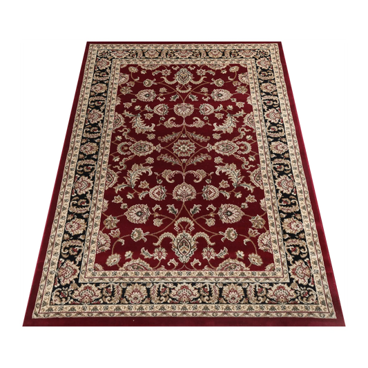 Angled view of Julian 90500 Red Black traditional rug showing red centre field, black border and detailed pattern, 230 x 160 cm