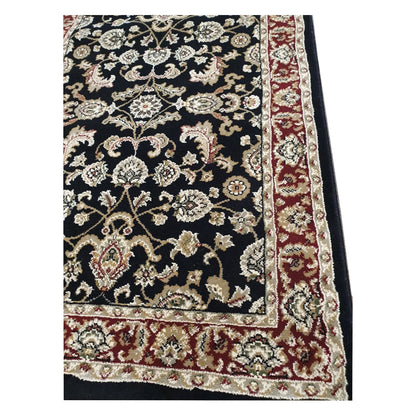 Corner and border detail of Julian black runner rug with floral pattern