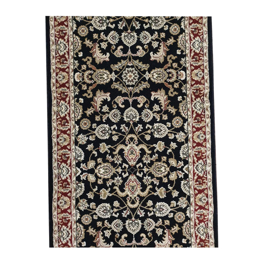 Field detail of Julian black runner rug showing ivory floral motifs and vinework