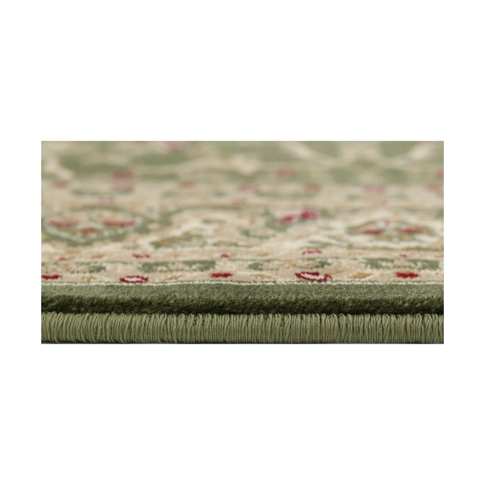 Close-up of Julian Traditional Designer Green rug showing edge detail, polypropylene pile texture and soft green tones, 290 x 200 cm