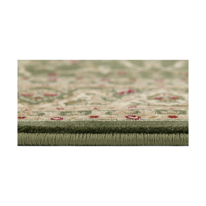 Close-up of Julian Traditional Designer Green rug showing edge detail, polypropylene pile texture and soft green tones, 290 x 200 cm