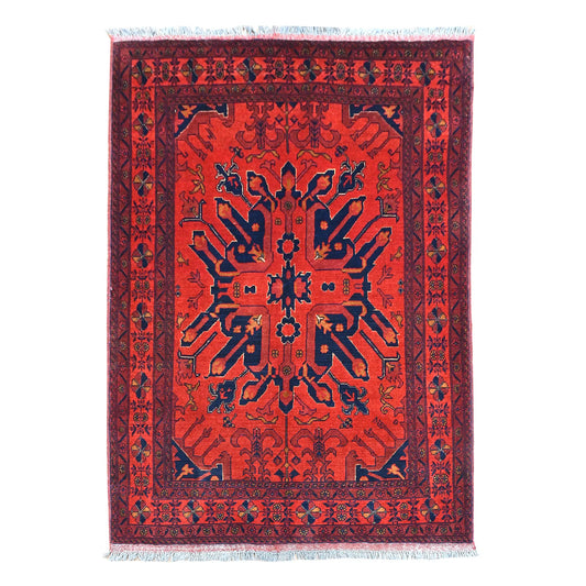 Full view of red Khal Mohammadi hand-knotted wool rug with a large navy radiating medallion and layered borders, 190 x 134 cm