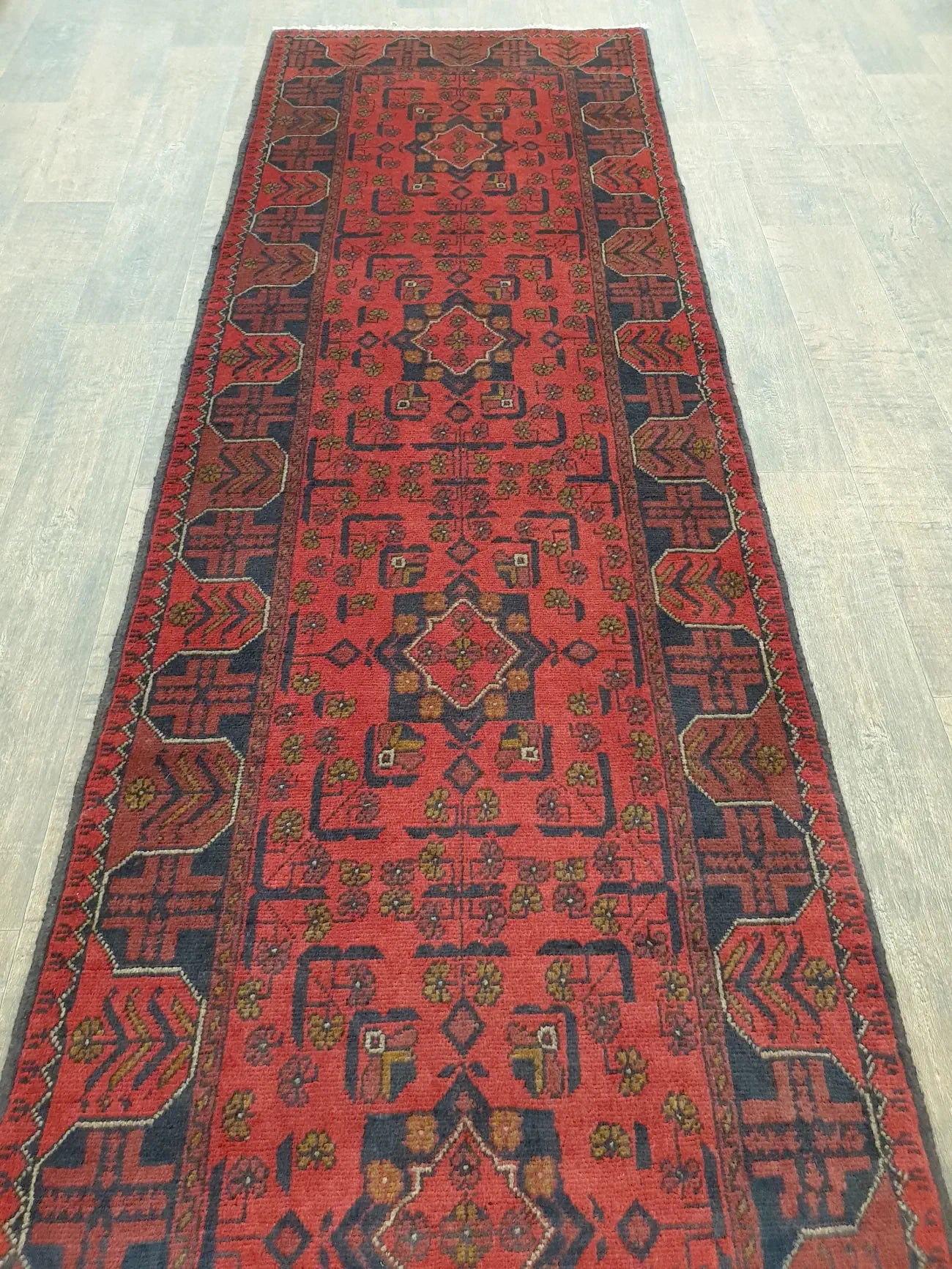 Khal Muhammadi runner rug 287 x 84 cm length view showing repeating motifs