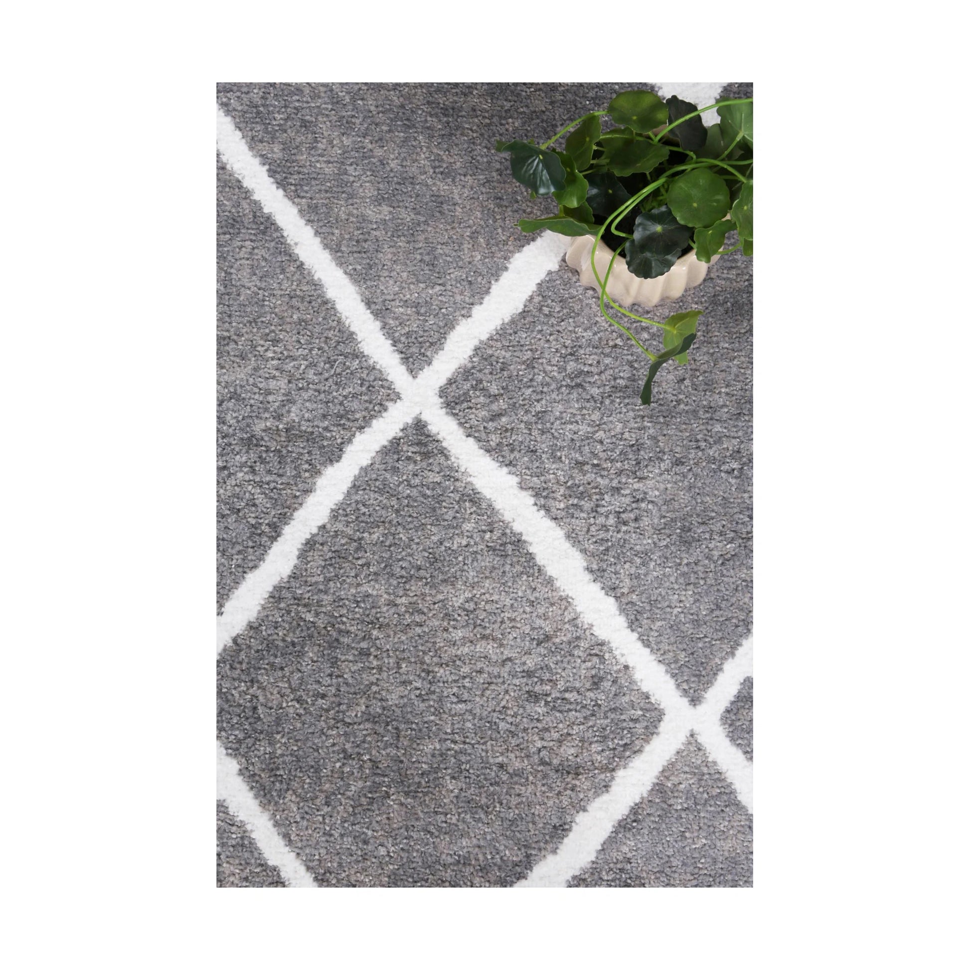 Close-up of grey pile and white trellis pattern on Kimberley 1 rug