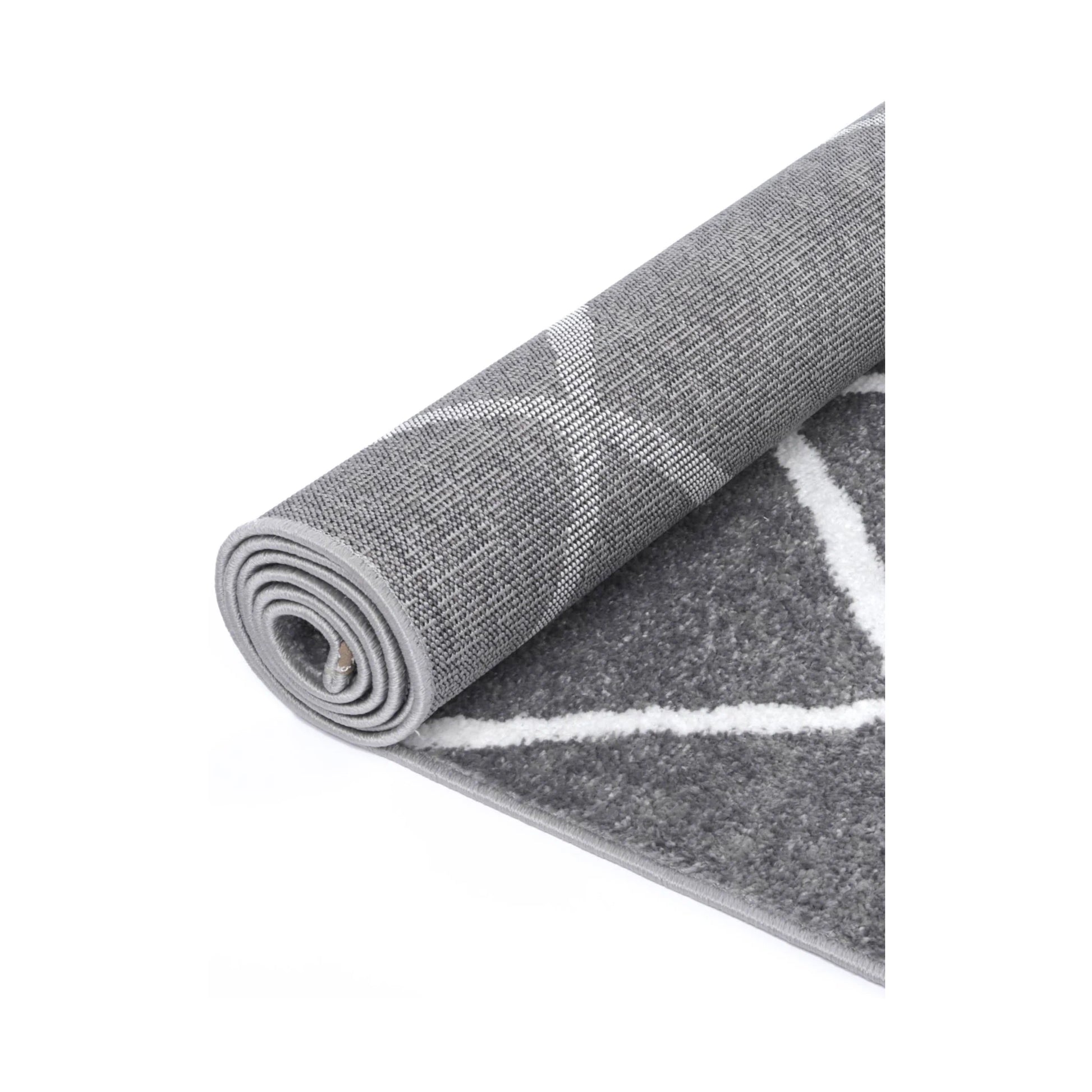 Rolled view of Kimberley 1 Trellis Grey Rug showing grey pile and trellis design