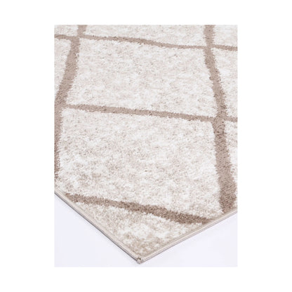 Corner detail of Kimberley 1 Trellis Latte rug showing bound edge, textured pile and modern lattice design, 230 x 160 cm
