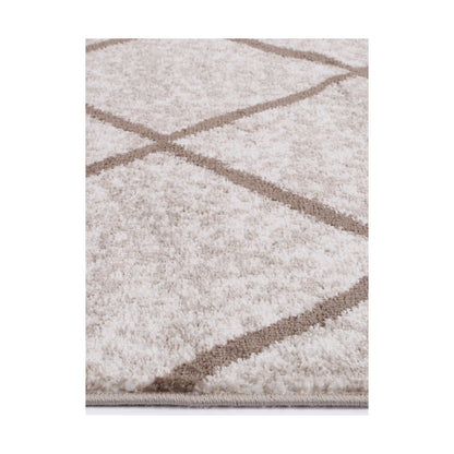Edge detail of Kimberley 1 Trellis Latte rug showing heatset polypropylene pile, soft neutral tones and trellis pattern, 230 x 160 cm
