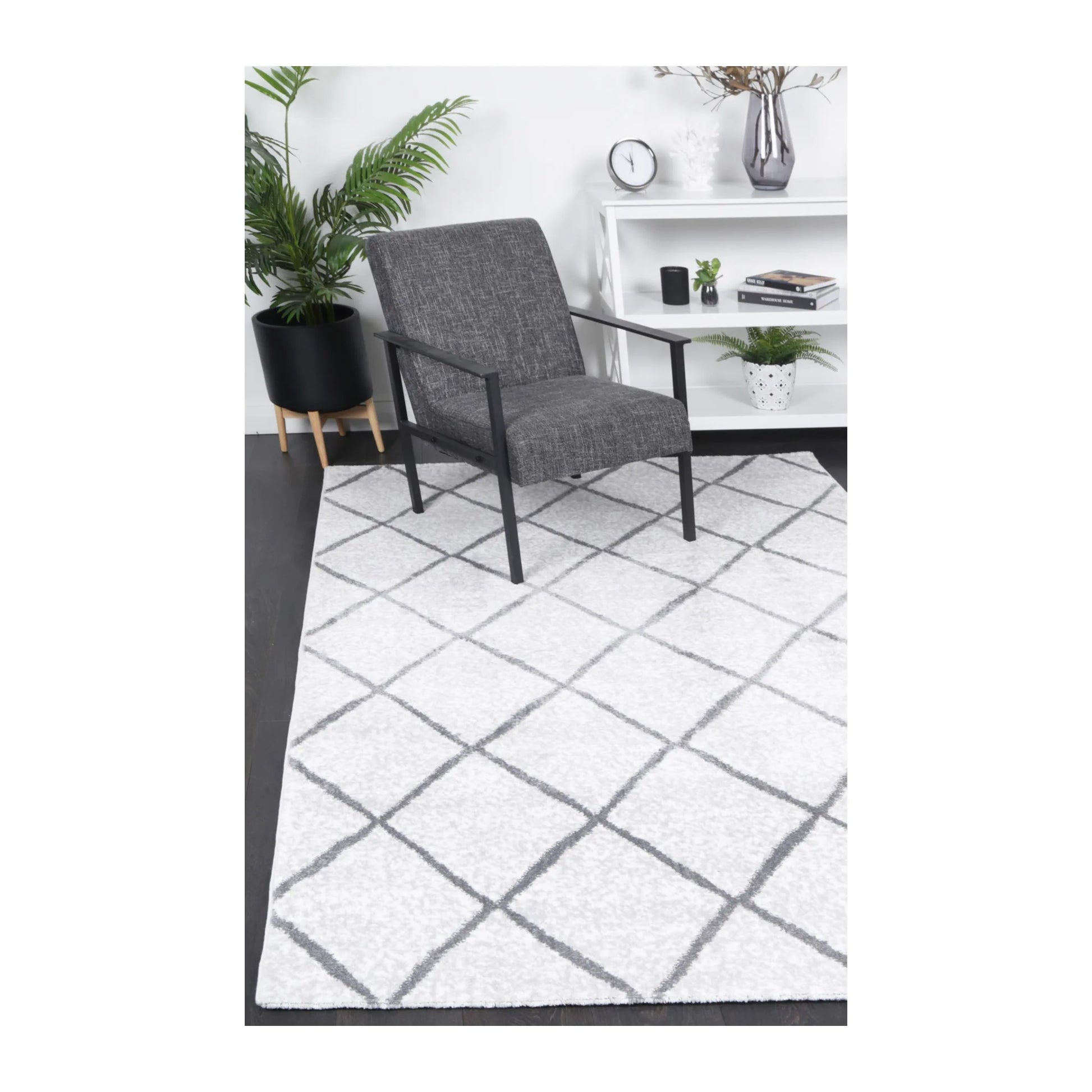 Kimberley 1 Trellis Silver rug styled with chair and indoor décor, showing modern grey trellis design, 290 x 200 cm