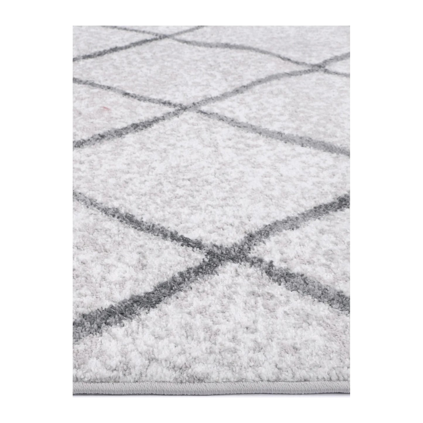 Close-up of Kimberley 1 Trellis Silver rug showing soft polypropylene pile and grey trellis pattern, 290 x 200 cm