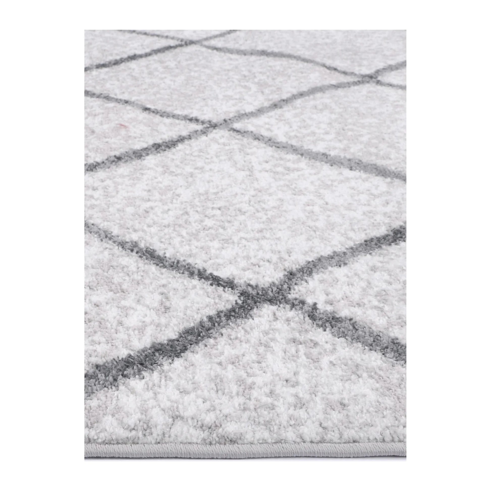 Close-up of Kimberley 1 Trellis Silver rug showing soft polypropylene pile and grey trellis pattern, 290 x 200 cm