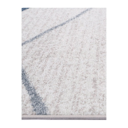 Edge detail of Kimberley 2 Blue Lattice rug showing soft pile texture, white field and blue line pattern, 230 x 160 cm