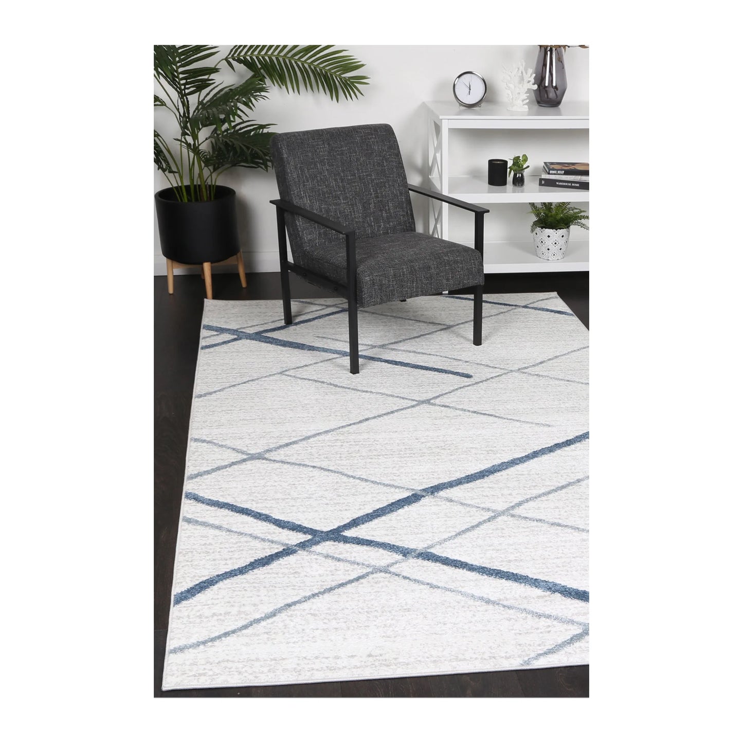 Kimberley 2 Blue Lattice rug styled with chair and indoor décor, showing modern blue white geometric design, 230 x 160 cm