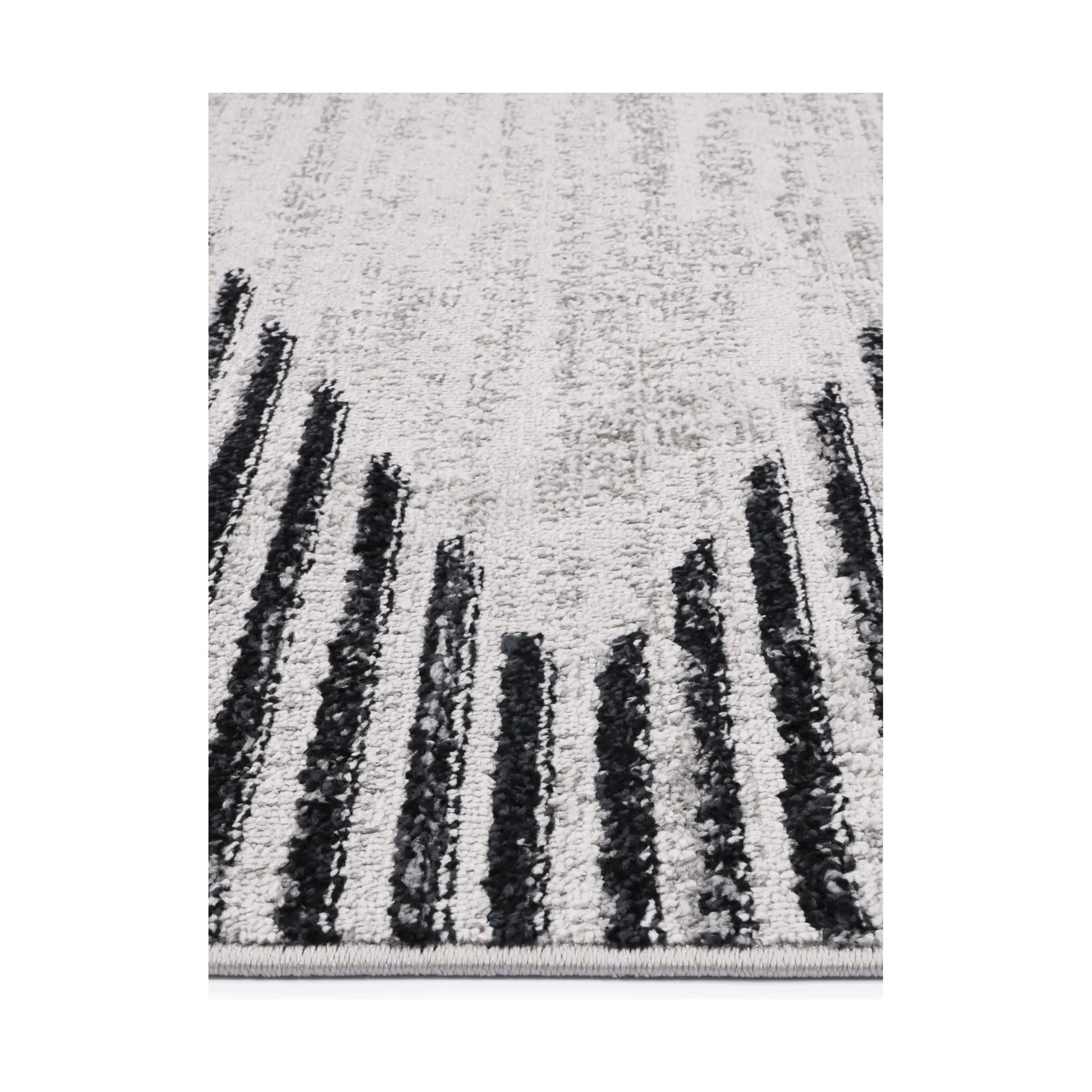 Edge detail of Kimberley 3 Diamond Charcoal rug showing heatset polypropylene pile, charcoal stripe detail and soft texture, 230 x 160 cm