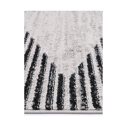 Edge detail of Kimberley 3 Diamond Charcoal rug showing heatset polypropylene pile, charcoal stripe detail and soft texture, 230 x 160 cm