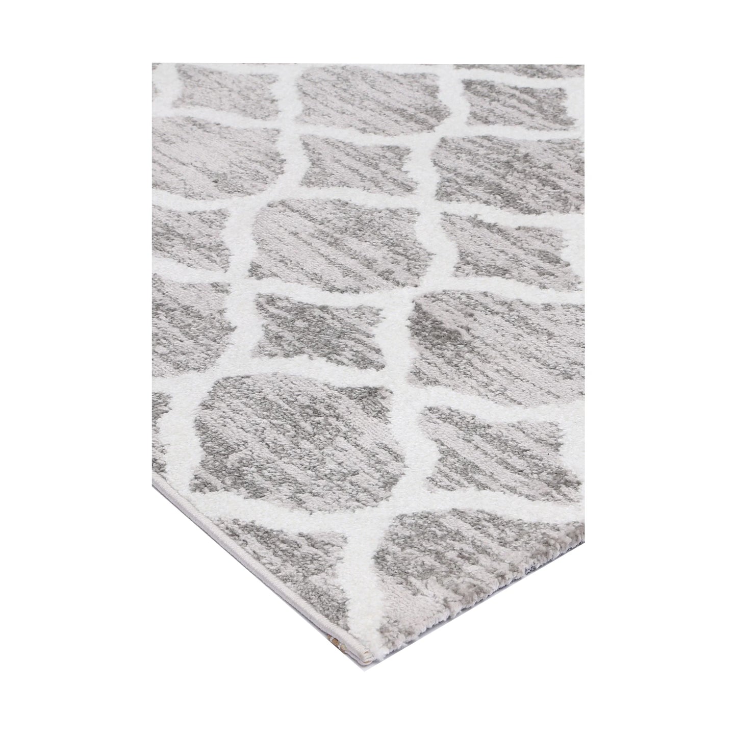 Corner detail of Kimberley 5 Repeat Silver Rug showing silver-grey field and white pattern