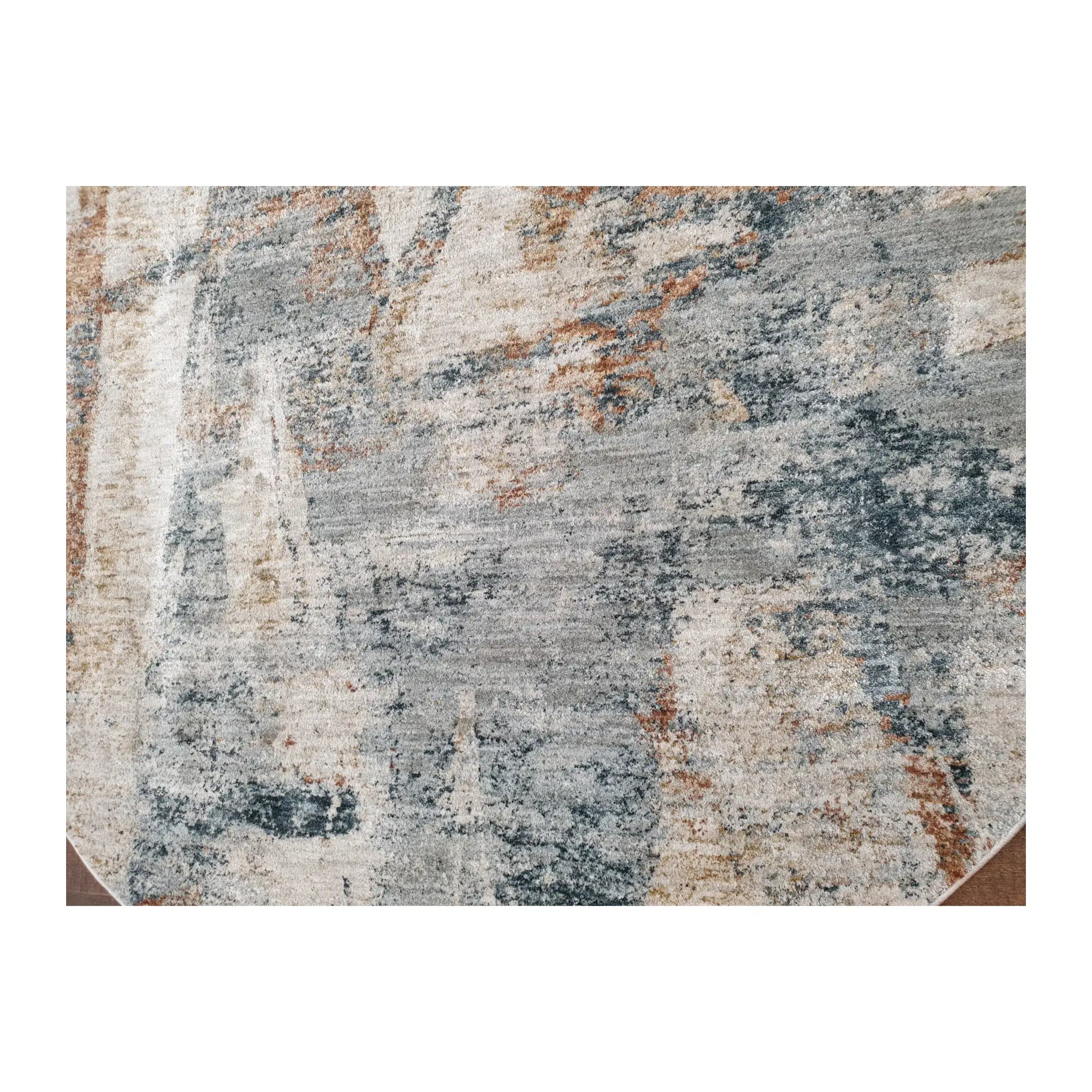 Close-up of light grey round rug with blue and rust abstract pattern detail, 160 cm