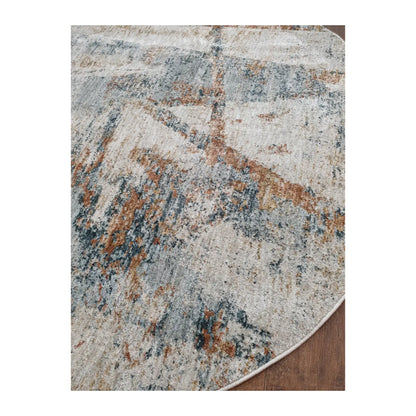 Low-angle close-up of light grey round rug showing surface texture and abstract brushstroke design, 160 cm