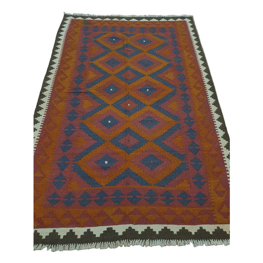 Full view of Mamina Kilim wool rug with maroon field, stepped diamond motifs and cream tribal end border, 243 x 160 cm