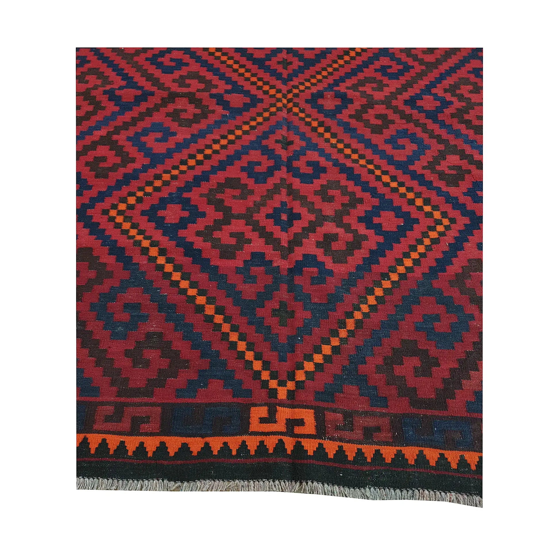 Geometric medallion and border detail of Mamina Kilim wool rug showing stepped tribal motifs and orange edging