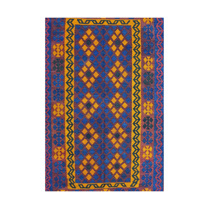 Close-up of Mamina Kilim wool rug showing purple blue geometric field with yellow, orange and red border details