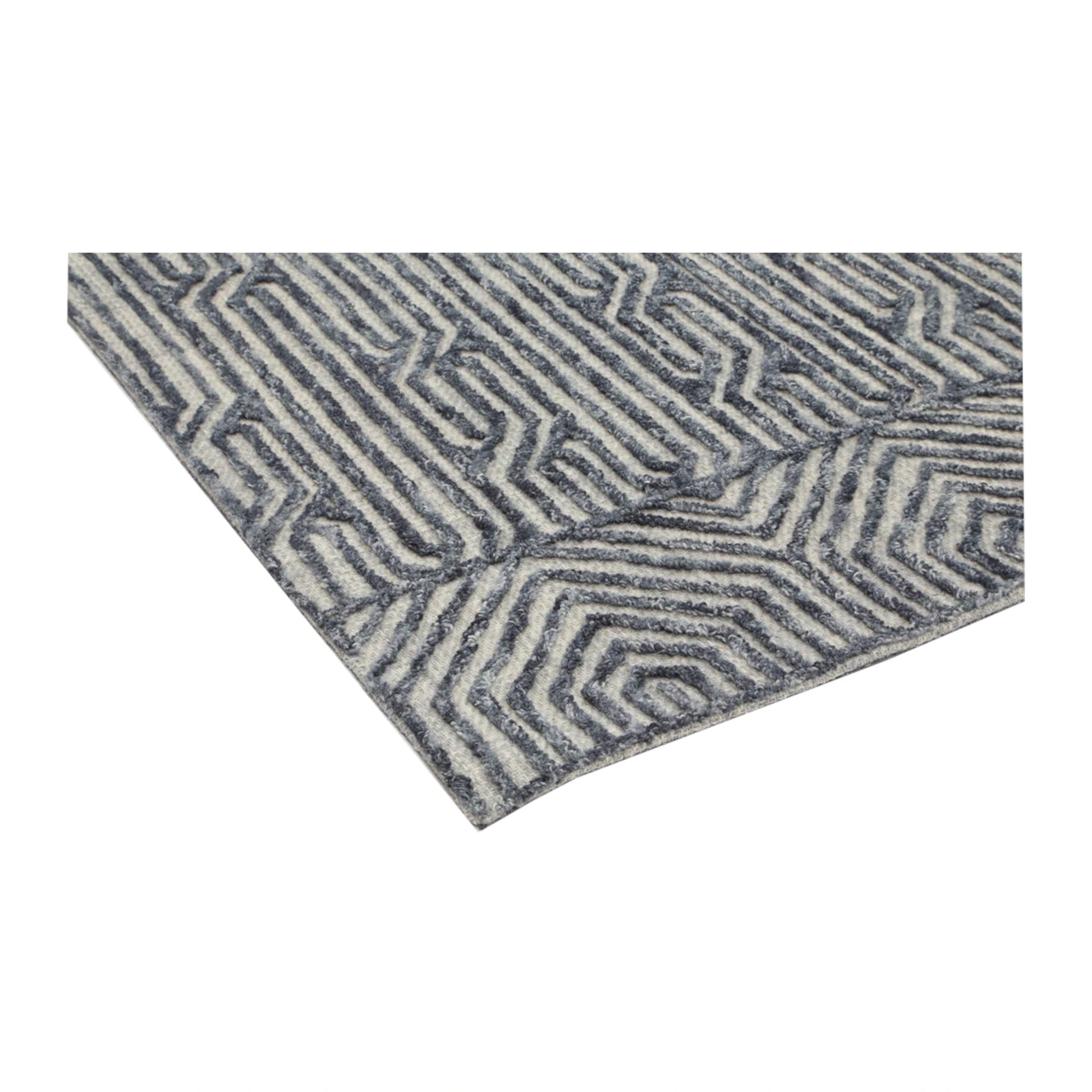 Corner detail of Marbella Almeria wool rug showing geometric texture