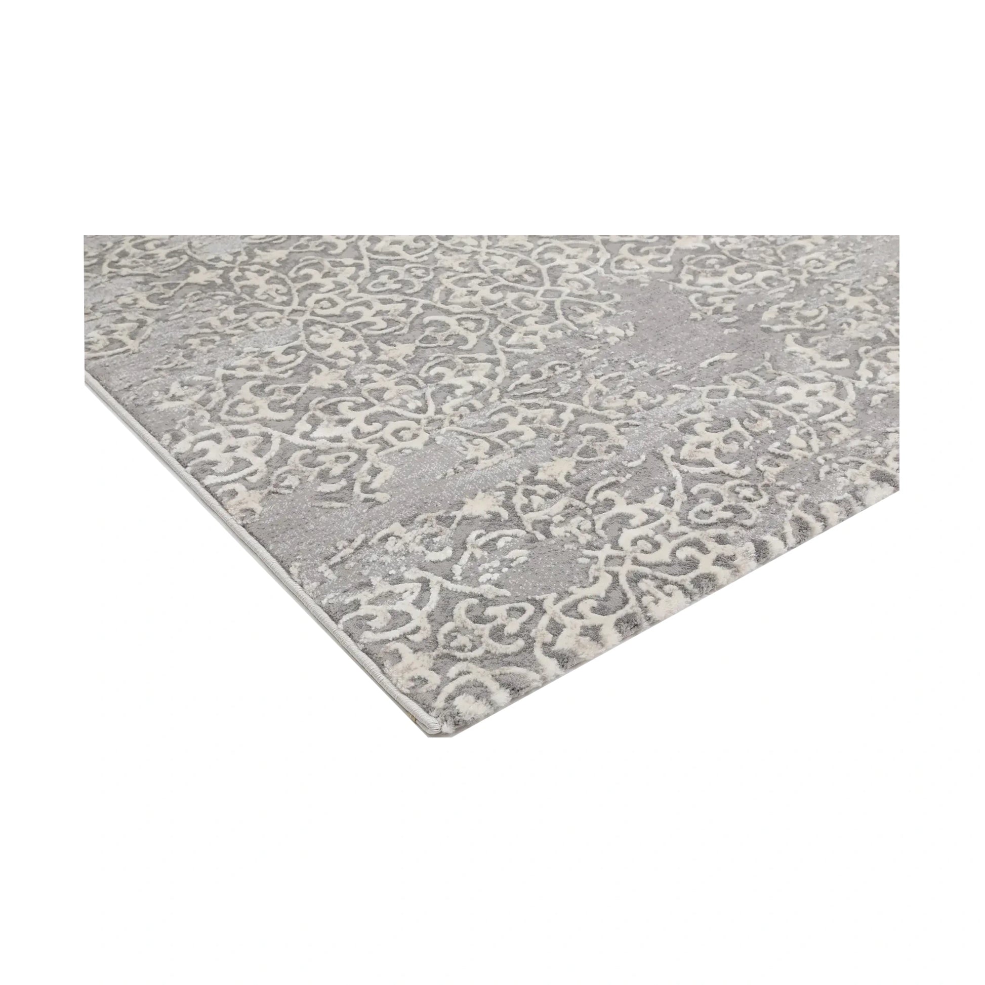 Corner detail of Modern Antalya Grey Designer Rug with soft grey and white distressed design
