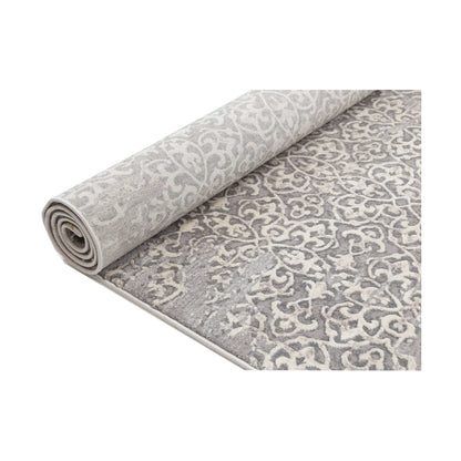 Rolled view of Modern Antalya Grey Designer Rug showing grey-white patterned surface