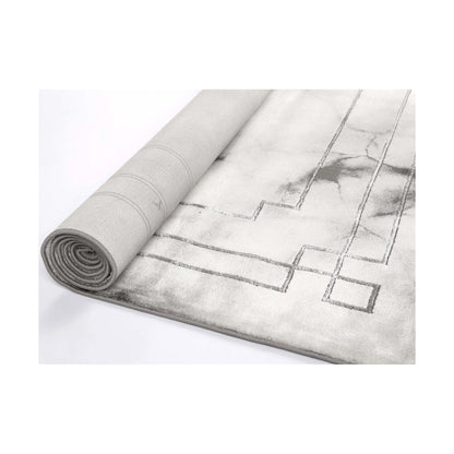 Rolled view of Modern Antep Grey Designer Rug showing grey and white marble-effect design