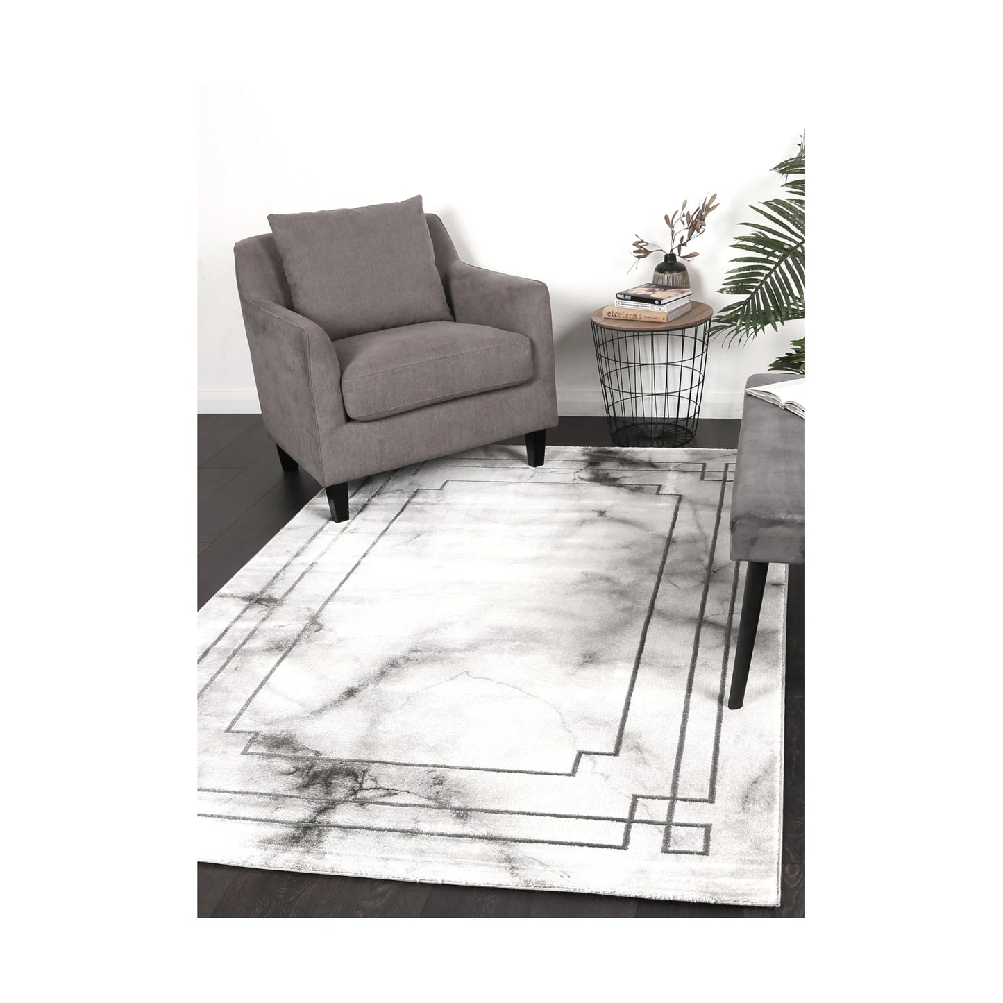 Modern Antep Grey Designer Rug styled in a contemporary lounge setting