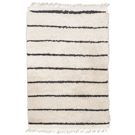 Full view of Moroccan Design hand-knotted wool rug with cream field, black horizontal stripes and fringe ends, 165 x 90 cm