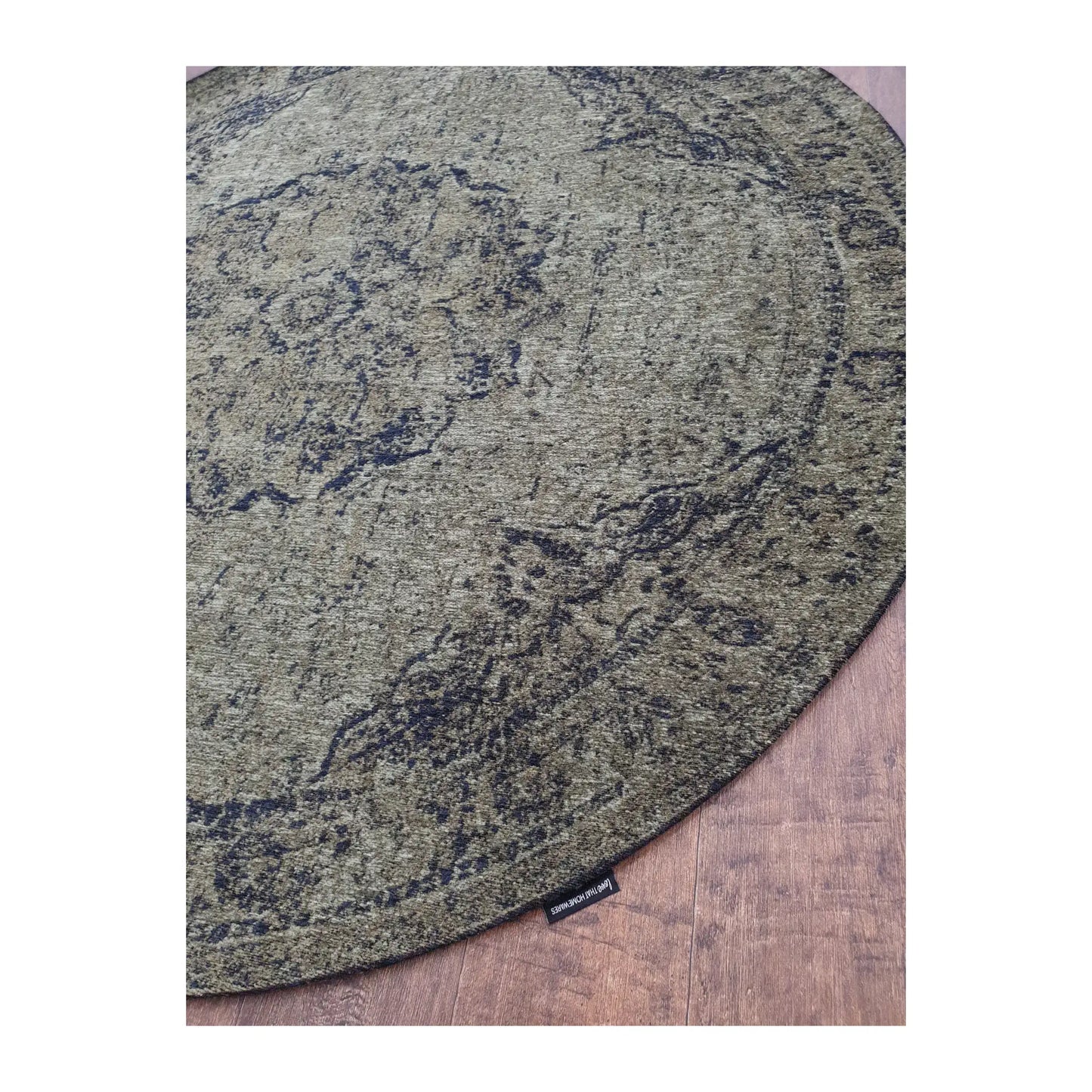 Angled detail of moss round rug showing pattern and edge finish, 160 cm