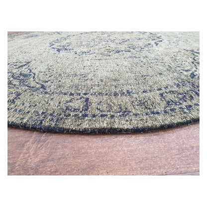 Low-angle close-up of moss round rug showing surface texture and medallion design, 160 cm